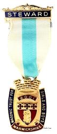 Знак MTGB 2001. STEWARD Masonic Trust for Girls and Boys.